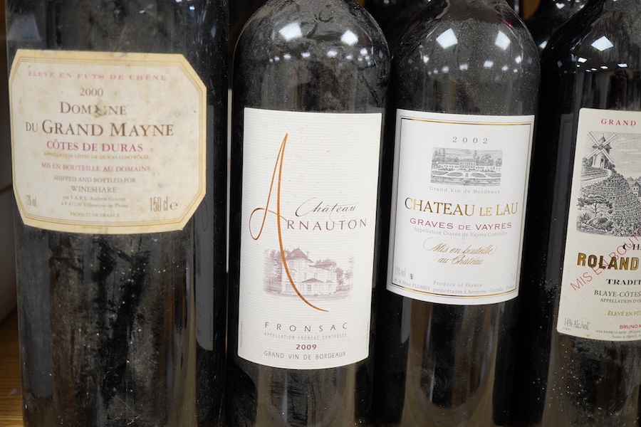 A bottle of Chateau Haut-Bages Liberal, 2001, and thirteen other bottles of red wine